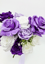 Artificial wedding rose posy, angled view of purple, lilac and white faux roses, small white flowers and lilac ribbons. Made in Melbourne by Flowers For Ever After, shipping Australia and Worldwide.