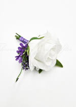 Artificial wedding boutonniere, top view of a white faux rose, small purple flowers and lavender sprigs. For formals, proms and ball occasions. Made in Melbourne by Flowers For Ever After, shipping Australia and Worldwide.