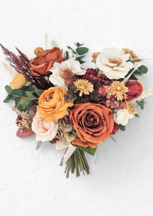 Artificial wedding bridal bouquet with rust, golden yellow and burgundy faux roses, white open blooms, golden daisies and eucalyptus. Made in Melbourne by Flowers For Ever After, shipping Australia and Worldwide.