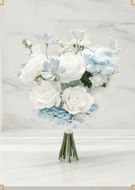 Artificial wedding bridesmaid bouquet with white faux roses, pale blue flowers, blue hydrangea and a white-wrapped handle. Made in Melbourne by Flowers For Ever After, shipping Australia and Worldwide.