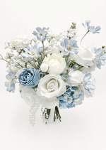 Artificial wedding bridal bouquet with white and dusty blue faux roses, pale blue flowers, white sprigs and dangling pearl strands. Made in Melbourne by Flowers For Ever After, shipping Australia and Worldwide.