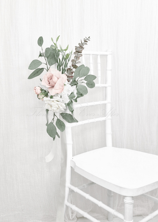 Artificial wedding pew flower decoration with blush and white faux roses, small flowers and green foliage tied with ribbon. Made in Melbourne by Flowers For Ever After, shipping Australia and Worldwide.