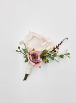 Artificial wedding groom boutonniere with a pale blush faux rose, smaller dusty pink rose, greenery and ivory-wrapped stems. For formals, proms and ball occasions. Made in Melbourne by Flowers For Ever After, shipping Australia and Worldwide.