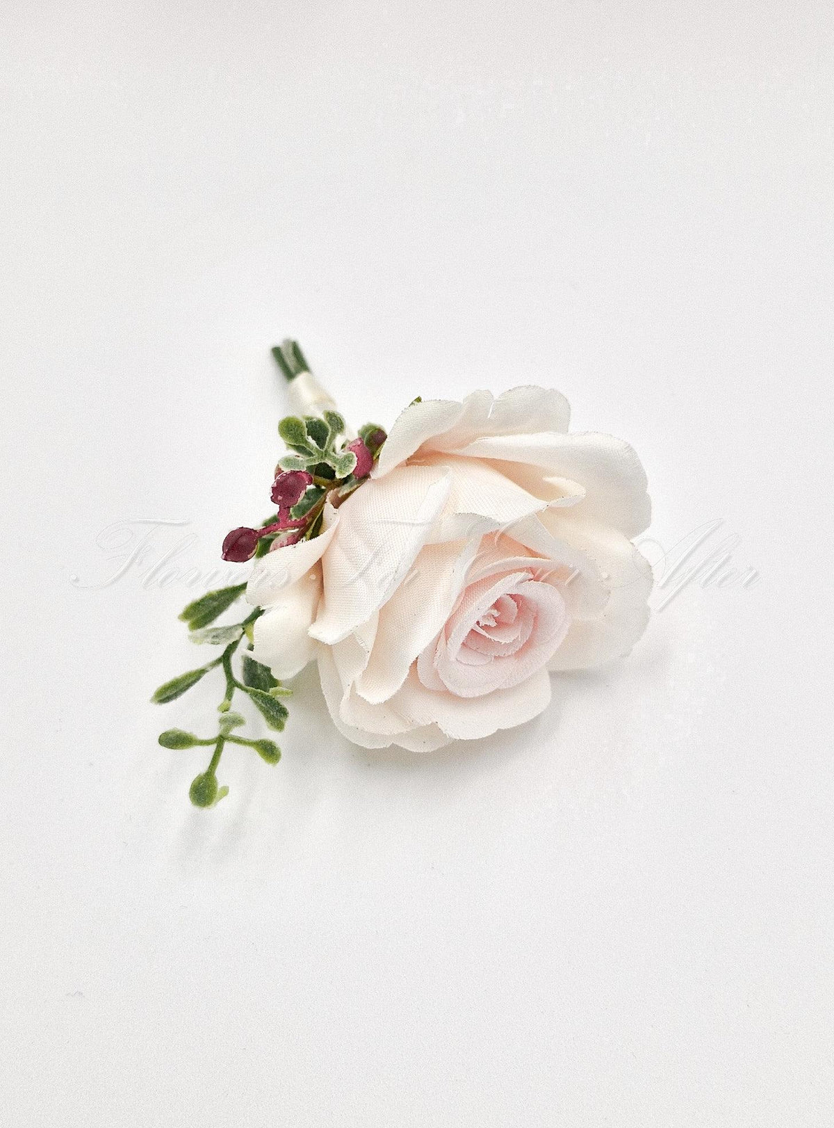 Artificial wedding groomsman boutonniere, front view of a pale blush faux rose with greenery and burgundy accents. For formals, proms and ball occasions. Made in Melbourne by Flowers For Ever After, shipping Australia and Worldwide.