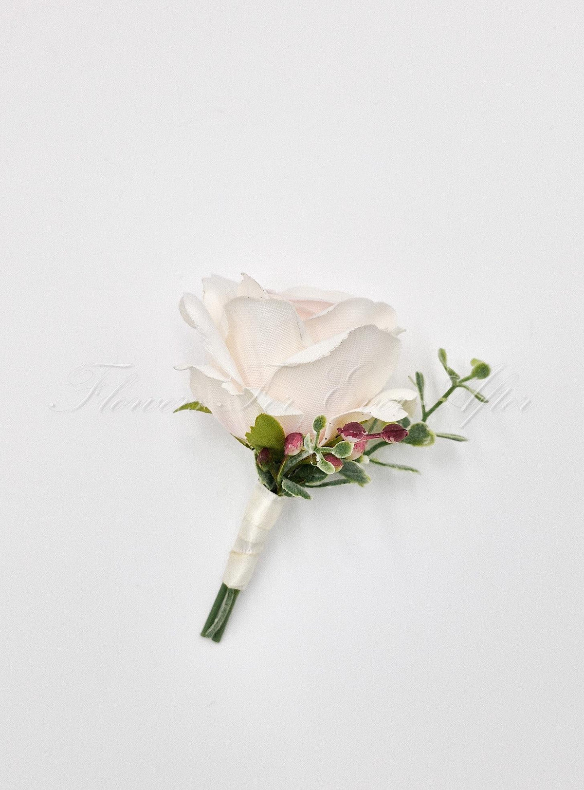 Artificial wedding groomsman boutonniere, side view of a pale blush faux rose, greenery and ivory-wrapped stems. For formals, proms and ball occasions. Made in Melbourne by Flowers For Ever After, shipping Australia and Worldwide.