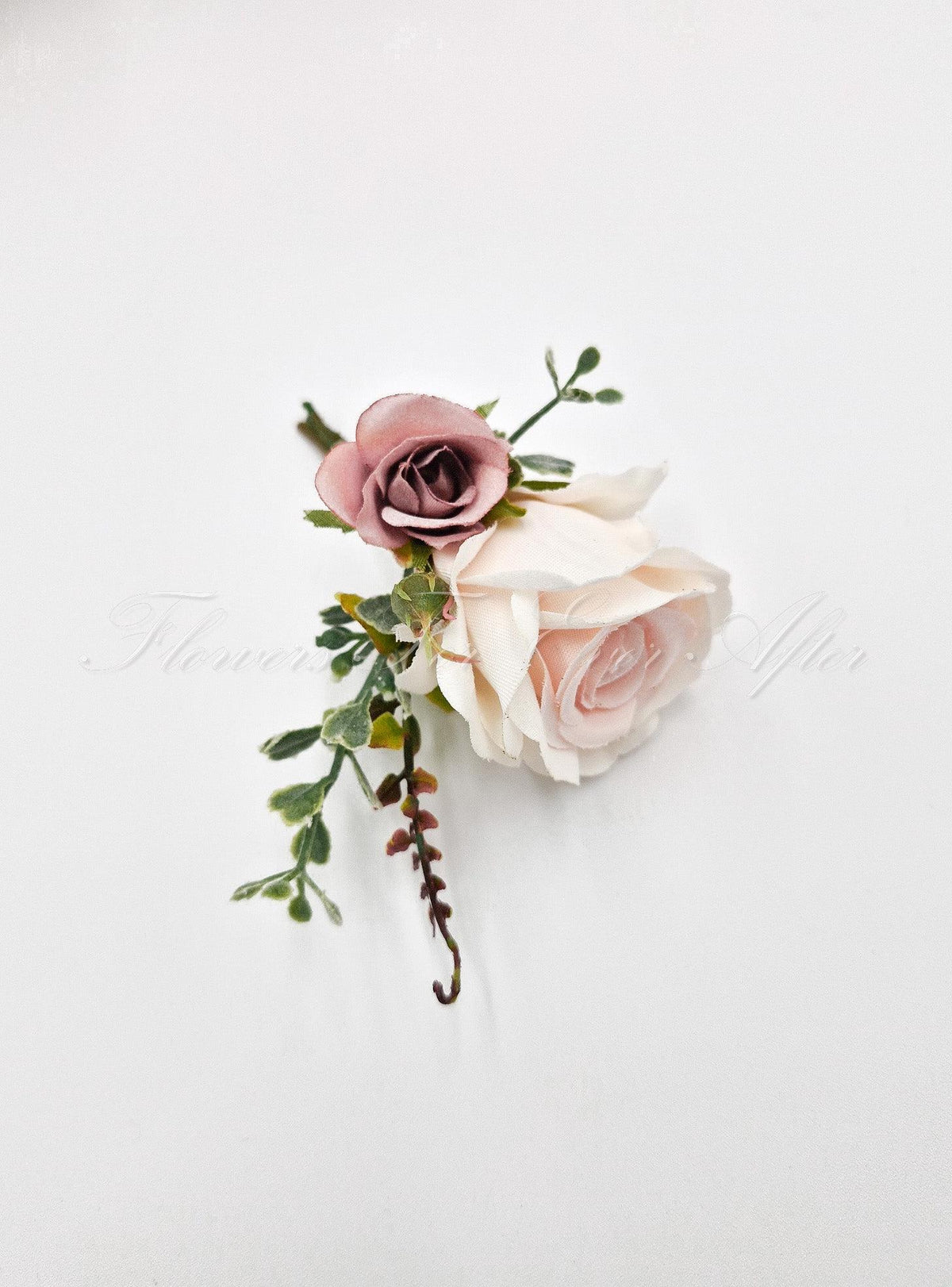 Artificial wedding groom boutonniere, angled view of two blush-toned faux roses, green leaves and burgundy sprigs. For formals, proms and ball occasions. Made in Melbourne by Flowers For Ever After, shipping Australia and Worldwide.