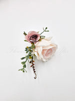 Artificial wedding groom boutonniere, angled view of two blush-toned faux roses, green leaves and burgundy sprigs. For formals, proms and ball occasions. Made in Melbourne by Flowers For Ever After, shipping Australia and Worldwide.