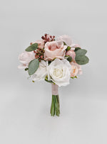 Artificial wedding flower girl posy, front view of blush and white faux roses with eucalyptus and green stems. Made in Melbourne by Flowers For Ever After, shipping Australia and Worldwide.