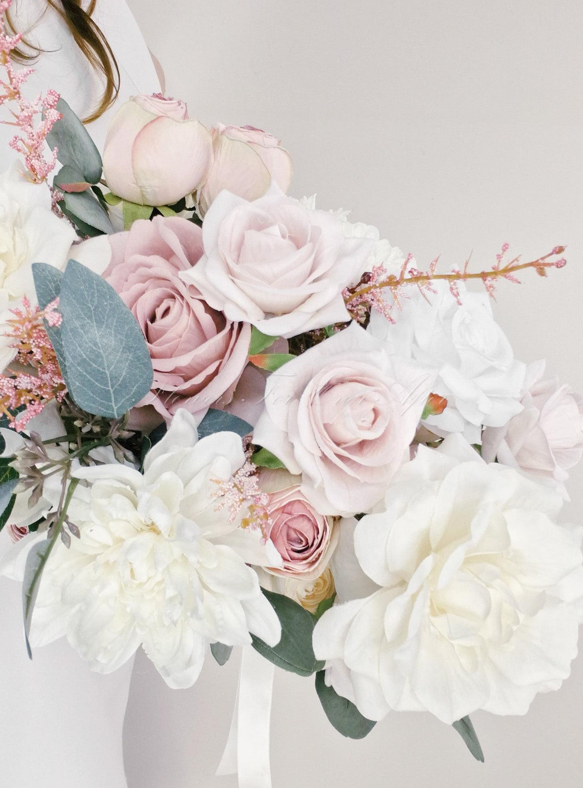 Artificial wedding bridal bouquet close-up with blush faux roses, white blooms, eucalyptus leaves and delicate pink sprigs. Made in Melbourne by Flowers For Ever After, shipping Australia and Worldwide.