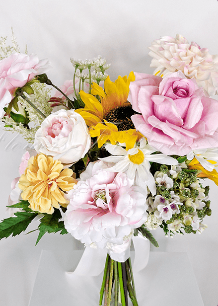 Artificial wedding bridesmaid bouquet, angled view of mixed faux flowers and wrapped stems. Made in Melbourne by Flowers For Ever After, shipping Australia and Worldwide.