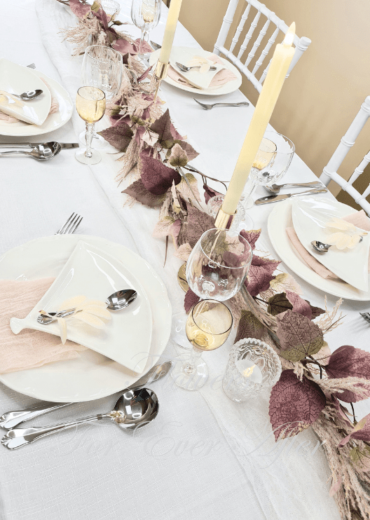 Artificial wedding garland, angled view of dusty pink and white faux roses, pale berry sprays and trailing greenery. Made in Melbourne by Flowers For Ever After, shipping Australia and Worldwide.