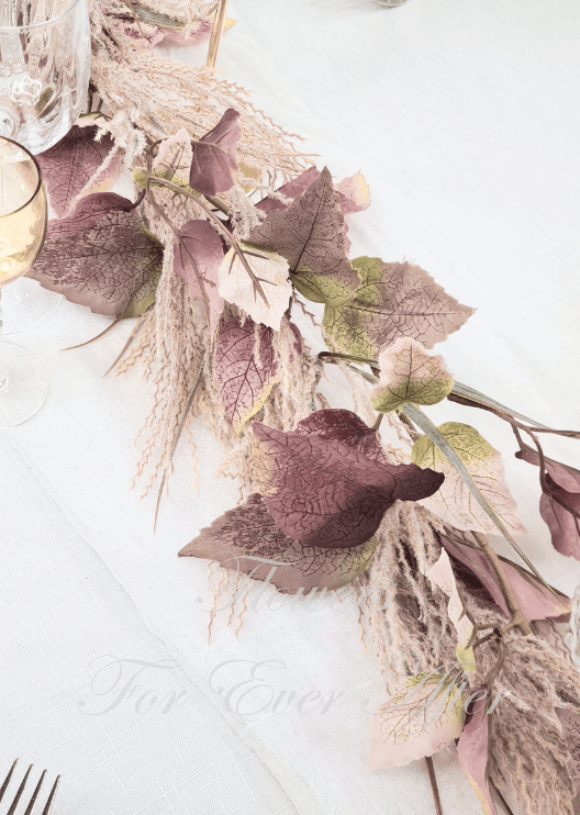 Artificial wedding floral garland close-up with dusty pink and white faux roses, pale berries and green leaves. Made in Melbourne by Flowers For Ever After, shipping Australia and Worldwide.