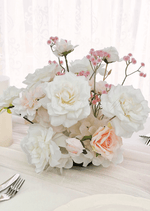 Artificial wedding table arrangement with white faux flowers and pale filler sprigs. Made in Melbourne by Flowers For Ever After, shipping Australia and Worldwide.