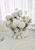 Artificial wedding table centrepiece, front view of mixed faux blooms and green leaves. Made in Melbourne by Flowers For Ever After, shipping Australia and Worldwide.