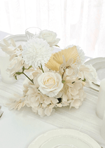 Artificial wedding table centrepiece close-up with white faux flowers and green foliage. Made in Melbourne by Flowers For Ever After, shipping Australia and Worldwide.
