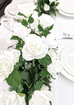 Artificial wedding floral arrangement close-up showing white faux flower petals and green foliage. Made in Melbourne by Flowers For Ever After, shipping Australia and Worldwide.