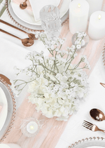 Artificial wedding table centrepiece, overhead view of white faux hydrangea blooms and branching baby's breath. Made in Melbourne by Flowers For Ever After, shipping Australia and Worldwide.