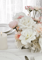 Artificial wedding table centrepiece close-up showing layered faux flower petals and green foliage. Made in Melbourne by Flowers For Ever After, shipping Australia and Worldwide.