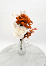 Artificial wedding bud-vase arrangement with rust-orange and white faux roses, white leaves and copper-coloured eucalyptus. Made in Melbourne by Flowers For Ever After, shipping Australia and Worldwide.
