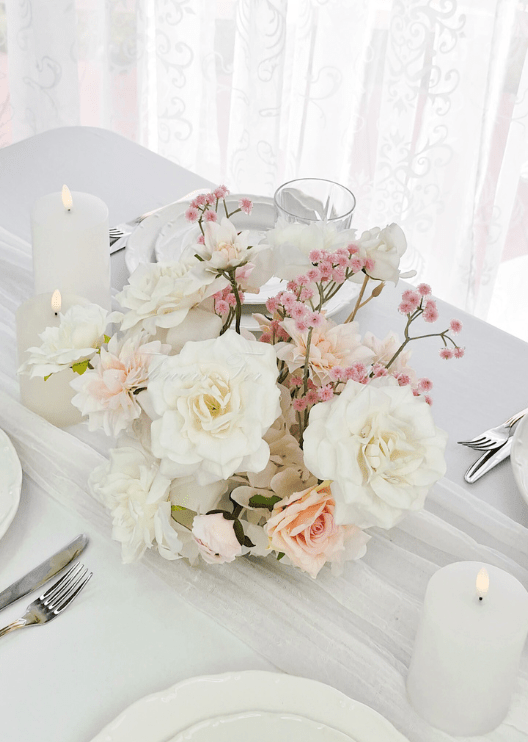 Artificial wedding table centrepiece with mixed faux flowers and green foliage. Made in Melbourne by Flowers For Ever After, shipping Australia and Worldwide.