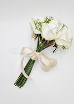 Artificial wedding toss posy, top view of small white faux blooms and green foliage. Made in Melbourne by Flowers For Ever After, shipping Australia and Worldwide.