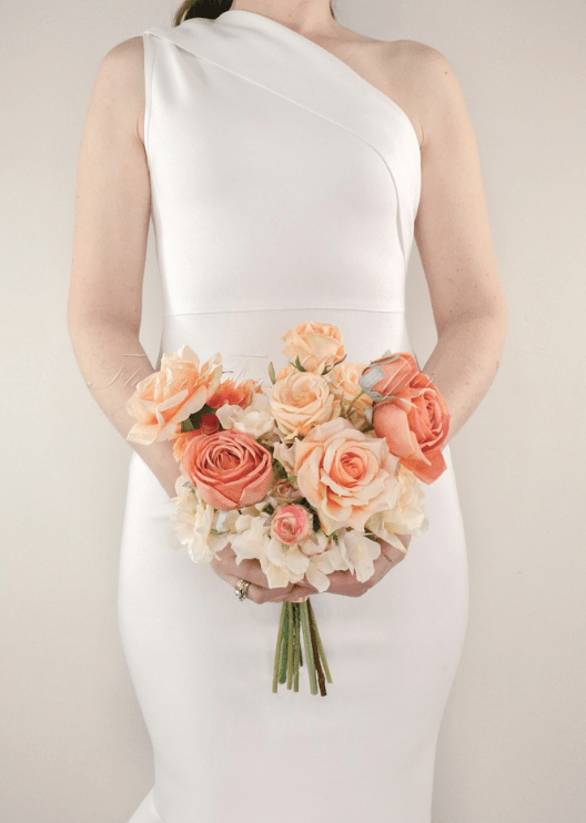 Artificial wedding bridal bouquet, front view of mixed faux flowers and green leaves. Made in Melbourne by Flowers For Ever After, shipping Australia and Worldwide.