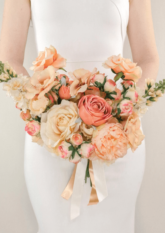 Artificial wedding bridesmaid bouquet with mixed faux blooms and green foliage. Made in Melbourne by Flowers For Ever After, shipping Australia and Worldwide.