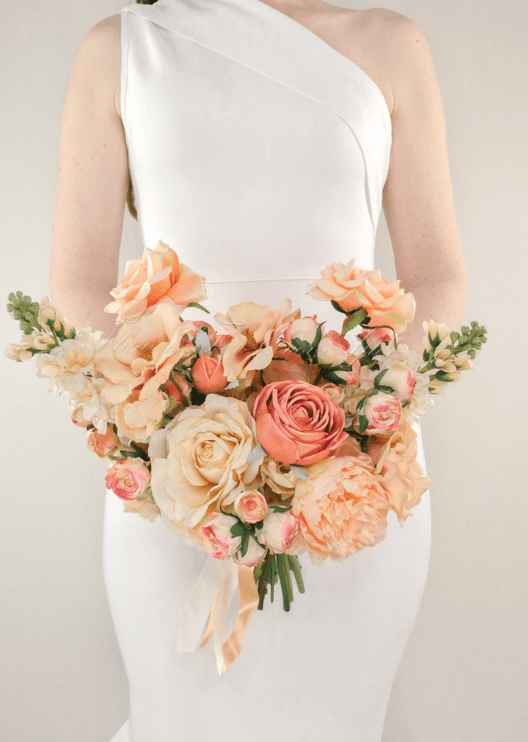 Artificial wedding bridesmaid bouquet, front view of mixed faux flowers and green leaves. Made in Melbourne by Flowers For Ever After, shipping Australia and Worldwide.