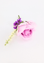 Artificial wedding boutonniere close-up with a pink faux rose, purple flowers, green sepals and a pale flower spike. For formals, proms and ball occasions. Made in Melbourne by Flowers For Ever After, shipping Australia and Worldwide.