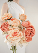 Artificial wedding bridal bouquet, angled view of mixed faux flowers and green leaves. Made in Melbourne by Flowers For Ever After, shipping Australia and Worldwide.