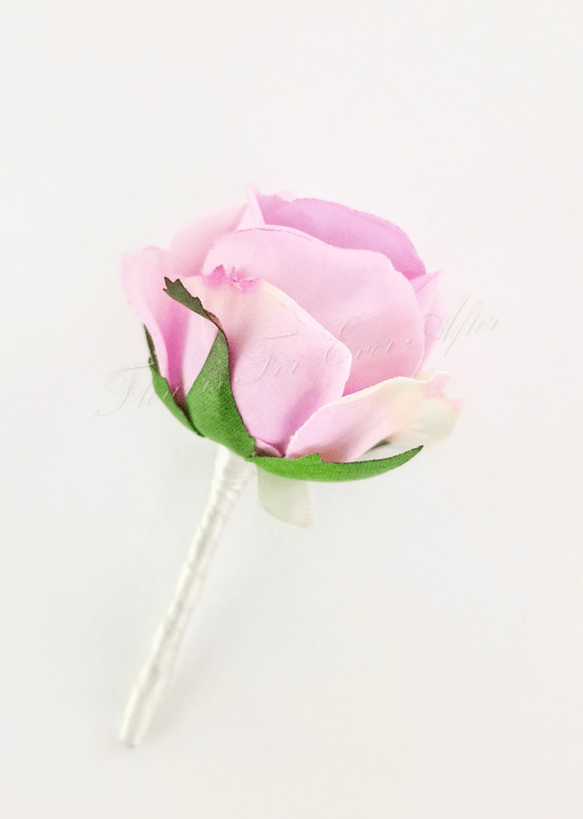 Artificial wedding boutonniere with a lilac faux rosebud, green sepals and a white-wrapped stem. For formals, proms and ball occasions. Made in Melbourne by Flowers For Ever After, shipping Australia and Worldwide.