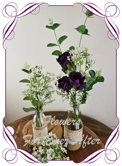 Silk artificial purple roses and baby's breath and eucalypt gum bunch cluster table centrepiece decoration. Wedding table florals. simple white wedding rustic table centrepiece. Made in Australia. Buy online. Shipping world wide