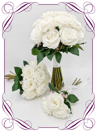 Artificial Bridal flowers in white and ivory silk roses. Silk wedding Bouquet posy, featuring faux flowers in a romantic elegant and unusual bridal style, classic white and traditional wedding bouquets. Made in Melbourne by Australia's Best Artificial Bridal Florist. Buy now Online. Worldwide Shipping available