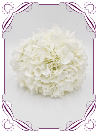 Artificial Bridal flowers in white hydrangea. Silk wedding Bouquet posy, featuring faux flowers in a romantic elegant and unusual bridal style, classic white and traditional wedding bouquets. Made in Melbourne by Australia's Best Artificial Bridal Florist. Buy now Online. Worldwide Shipping available