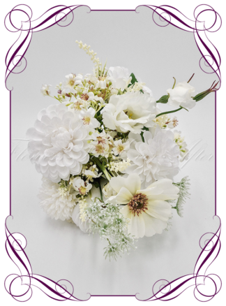 Artificial Bridal flowers in white and ivory silk roses. Silk wedding Bouquet posy, featuring faux flowers in a romantic elegant and unusual bridal style, wild flowers, meadow blooms, and garden florals. Made in Melbourne by Australia's Best Artificial Bridal Florist. Buy now Online. Worldwide Shipping available
