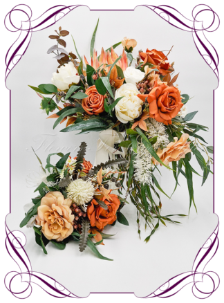 Silk Bridal Bouquet in realistic rust burnt orange, green leaves, and ivory, native faux flowers. Bridal posy, featuring artificial roses, bottle brush, banksia, peony, king protea flowers in a romantic rustic and unusual bridal style modern rustic wedding bouquets. Made in Melbourne by Australia's Best Artificial Bridal Florist. Buy online now. Worldwide Shipping available